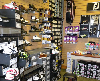 Shoes in proshop displayed on the wall